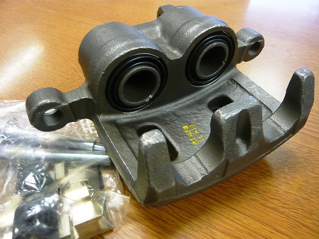 L400 - Front Brake Caliper with Bracket (Driver/Right Side)