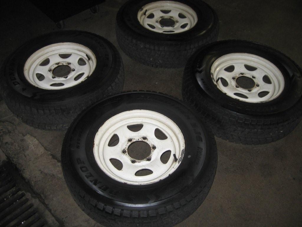 15 inch Dunlop Snow Tires / Steel Rims (Set of 4)